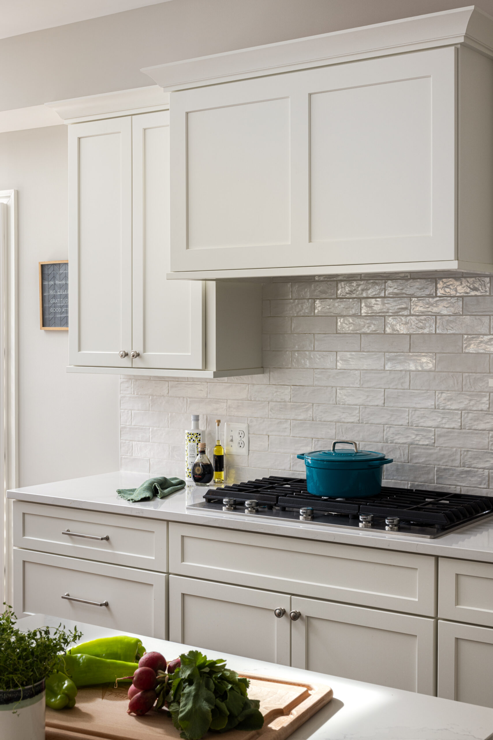 White Cabinetry With A Distinct Blue Green Island Kitchen Remodel in Oakton, VA by Jordan Design Build Group project photo 6